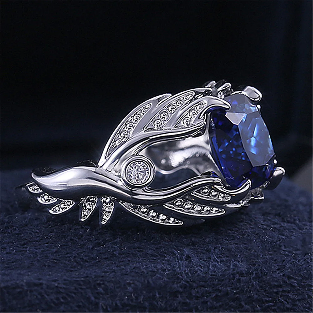 Moda anjo asas azuis cristal safira pedras preciosas diamantes anéis para mulheres homens branco ouro prata cor jóias bagaço acessório