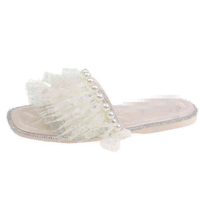 Pantofole a vento profumate con perle in rete le donne da indossare in sandali con fondo piatto con tacco basso e punta aperta alla moda estiva