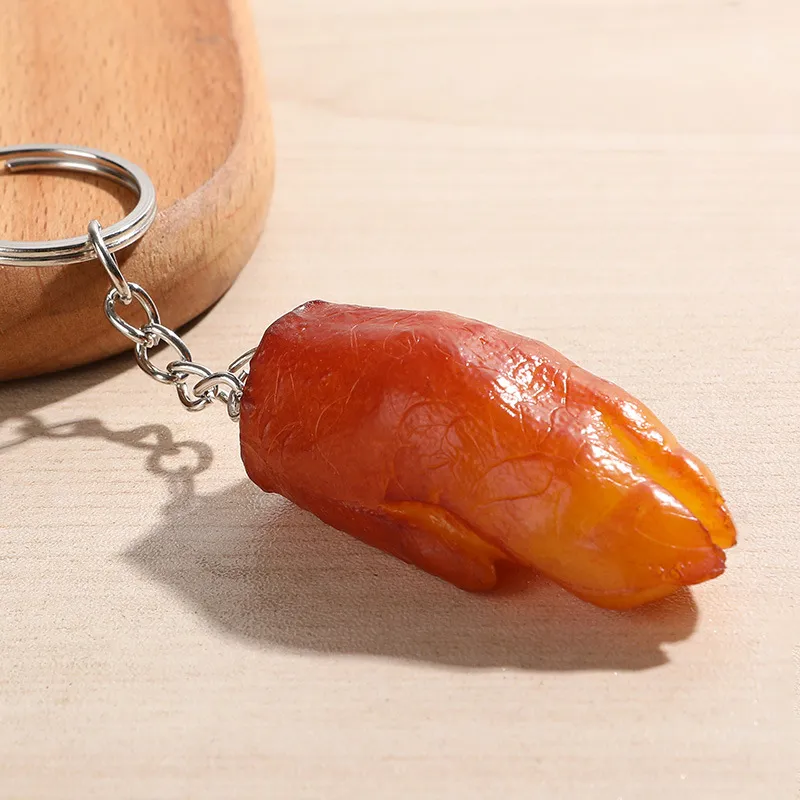 Key Creative Fashion Food Braised Pork KeyChain Pigs Fötter Kycklingvingar Modell Key Chain Car Bag Keyring Pendant Små gåvor NE3446868