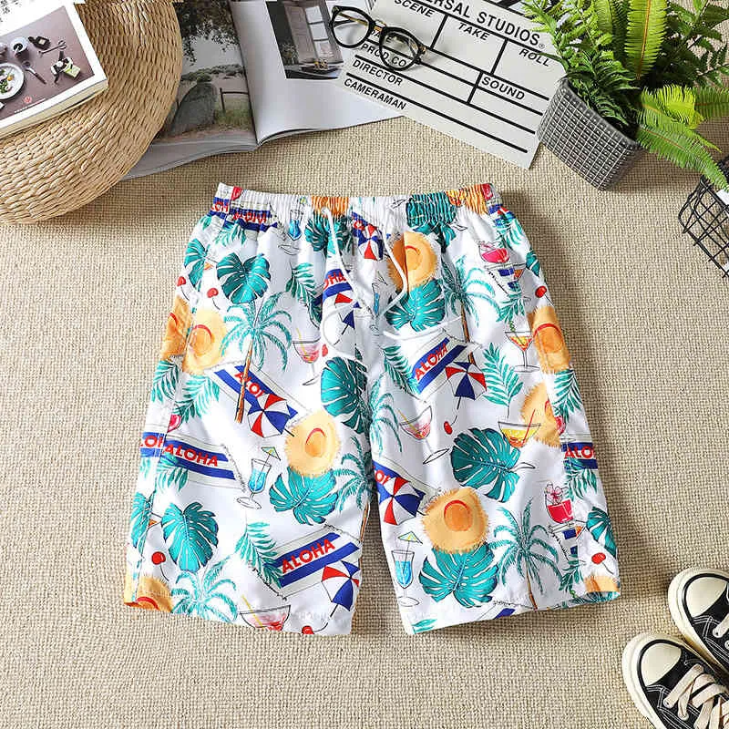 Pantaloni da spiaggia stampati moda estiva 2021 da uomo pantaloncini larghi a cinque punti ad asciugatura rapida a cinque punti plus size Y0408