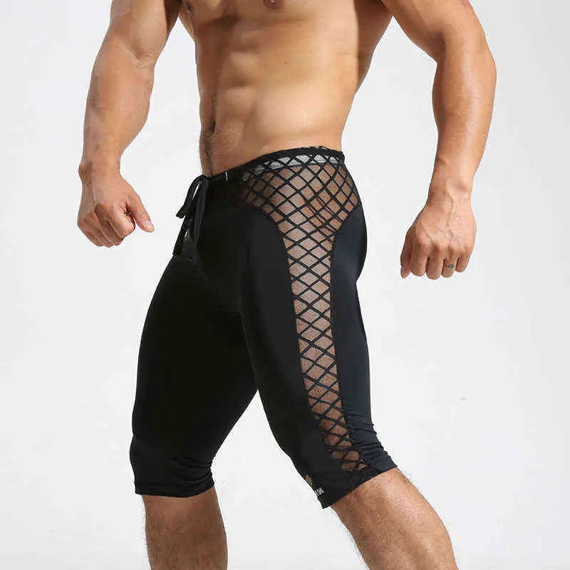 Mężczyzna Running Shorts Mężczyźni Szybki Suchy Szkolenia Fitness Kompresja Siłownia Spodenki Męskie Krótkie Fitness Tight Spodnie H1210