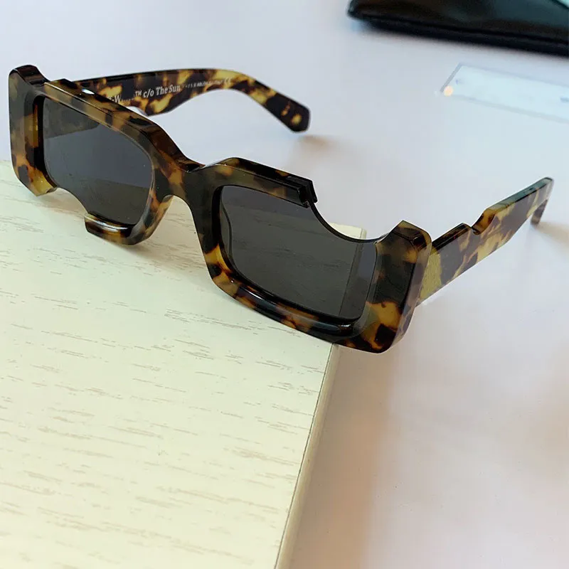 Off Designer Sunglasses OW40006U Męskie lub damskie Klasyczne dzikie wakacje grube deska fajna otwór okulary UNISEX UV400 Najwyższa jakość z 309D