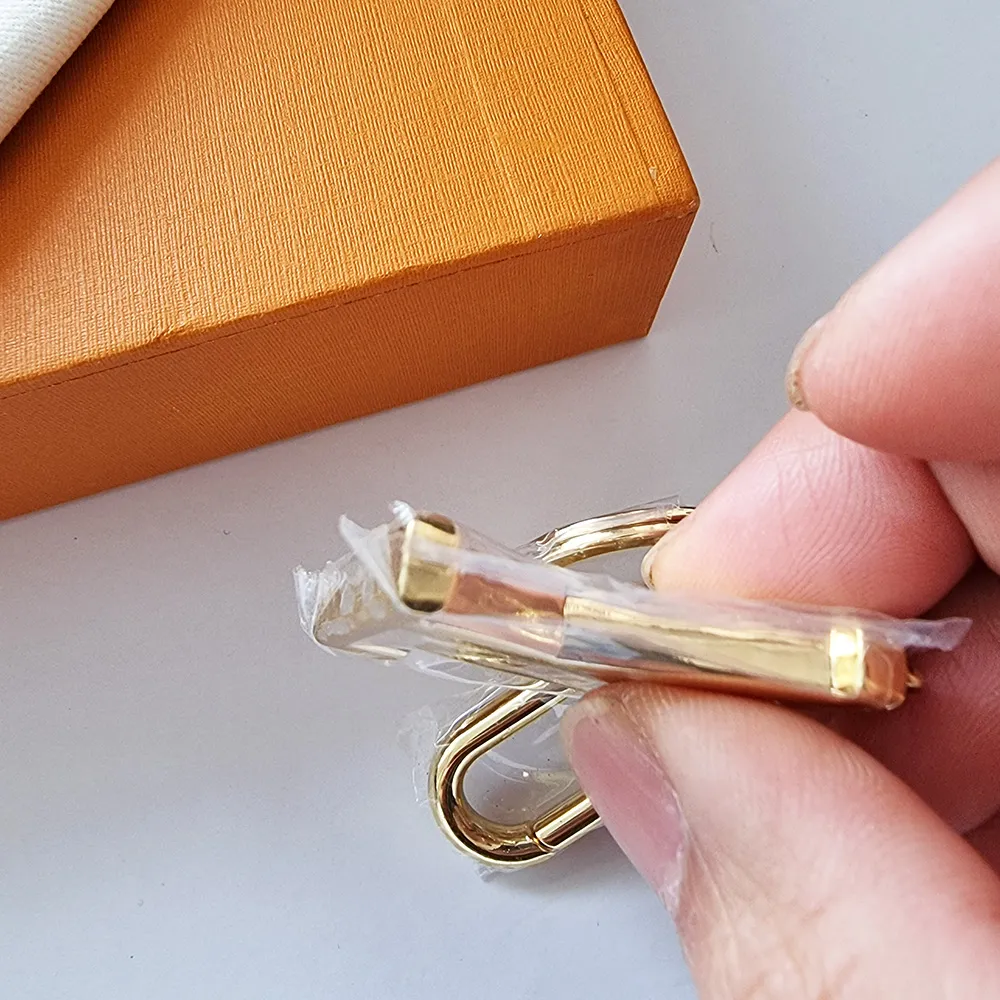 Nieuwe legering gouden ontwerp astronaut sleutelhangers accessoires designer sleutelhanger massief metalen autosleutel ring geschenkdoos packing207D