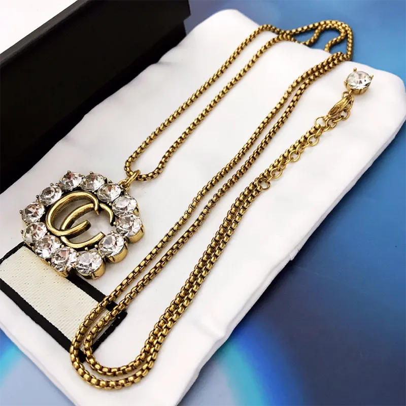 Damski złoty długi naszyjnik projektant list diamentowy wisiorek luksusowe G kobiety Fashion Party biżuteria diamentowy moment obrotowy naszyjniki D2109305HL