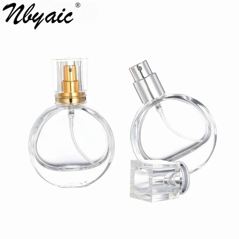 Perfume replacement bottle 25ml travel circular transparent glass empty bottle gold and silver nozzle press spray bottle