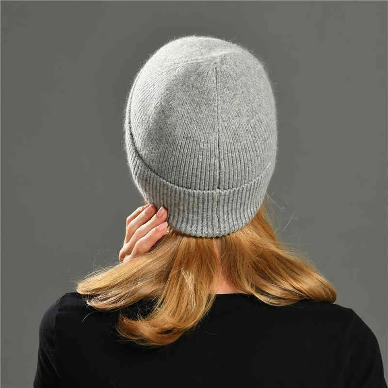 ニットビーニー帽子女性暖かい春秋ウール編み帽ファッション熱い販売の女性ストライプのスピルの帽子