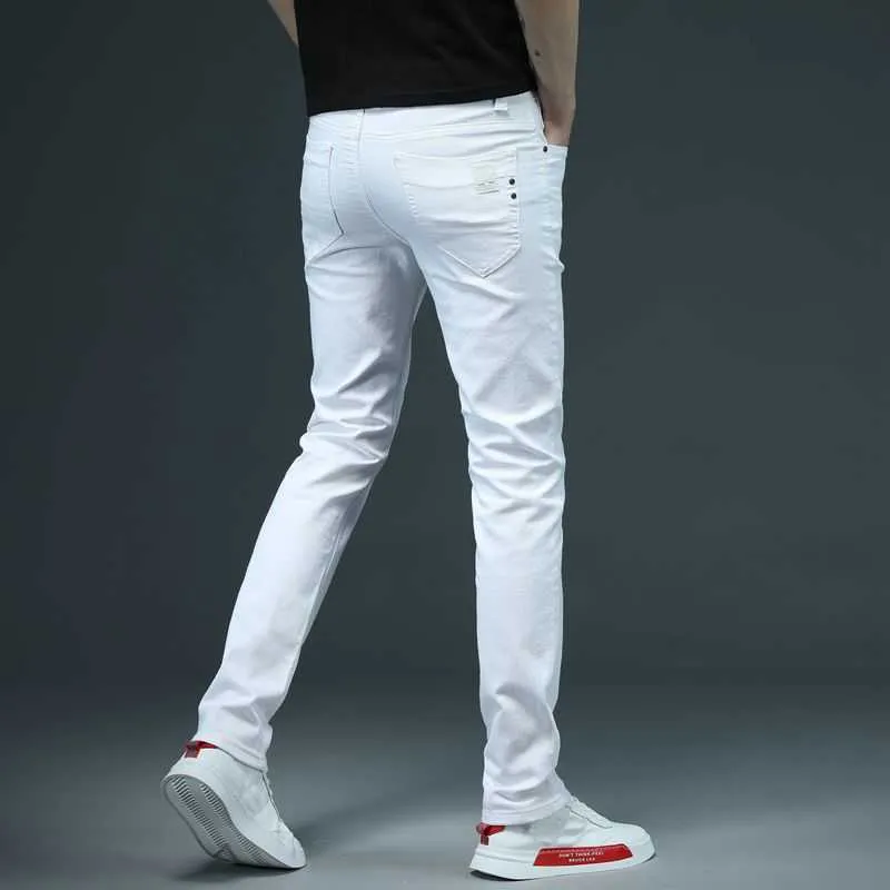 SHAN BAO hommes ajusté Slim blanc jean printemps classique marque haute qualité confortable coton Stretch mode pantalons décontractés 210723