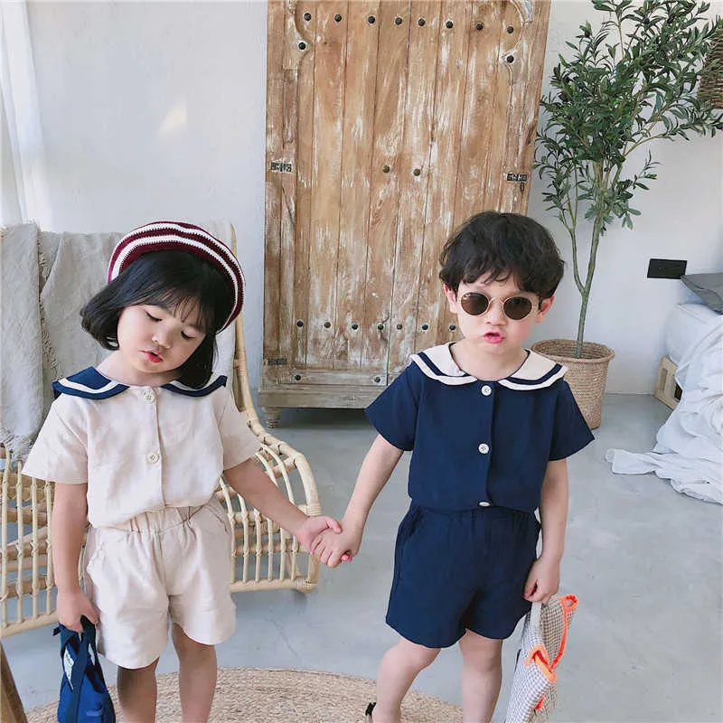 Lato Koreański styl Kids Sailor Collar Bawełniane ubrania Zestawy Cute Boys Girls Krótki Rękaw T Shirt + Spodenki 2szt G003 210615