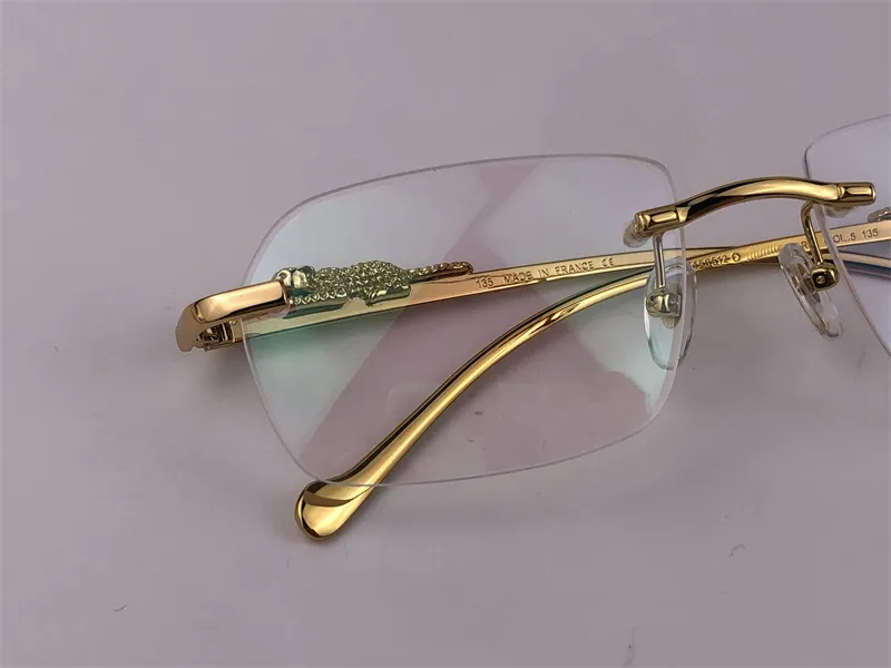 Ny modedesign Optiska ramglasögon 36456512 Liten oregelbunden ramfri transparent kristallskurna lins djurben retro klassiker209u