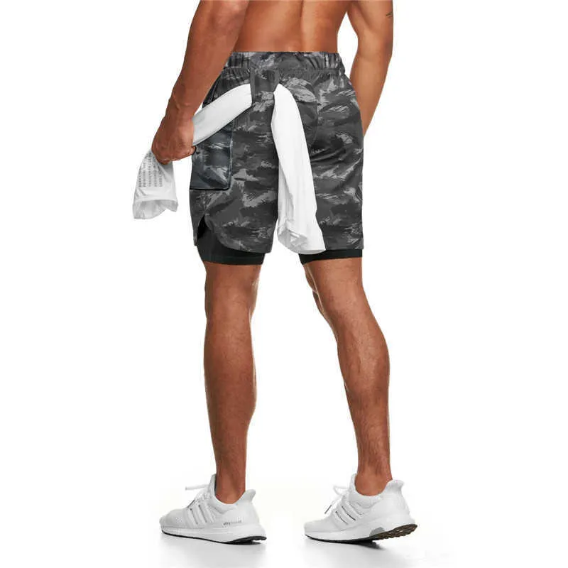 Été streetwear hommes shorts extérieur ample intérieur serré mode double couche pantalons de sport jogger gym exercice fitness pantalon X0628