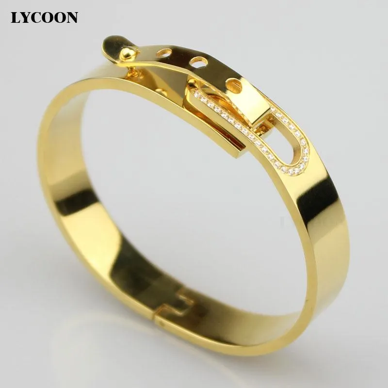 Mode kvinnor manschettform speciella låsarmband armband 316l rostfritt stål naglar armband armband gult guld med CZ214Y