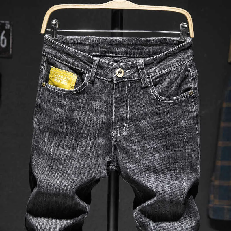 メンズジーンズスリムフィット男性春と秋のスリムな男のズボンメンズファッションジーンズパッチのパッチポケット男性服x0621