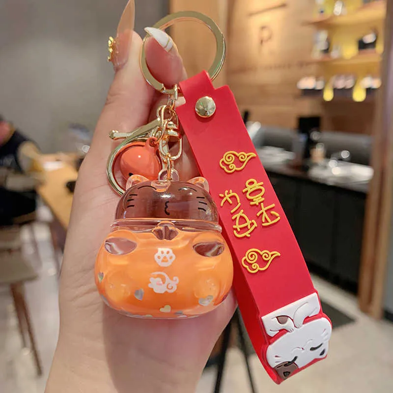 Creative Fashion Lucky Cat Transparent Floating Bottle Keychain Female Cute Acrylic Doll Nyckelringbil Pendant Smycken Gift G10199112547