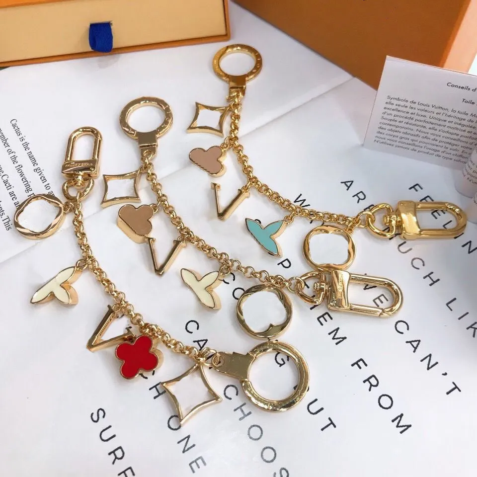 Designer de luxo chaveiro moda clássico marca chave fivela flor carta chaveiro artesanal ouro chaveiros das mulheres dos homens saco pingente286x