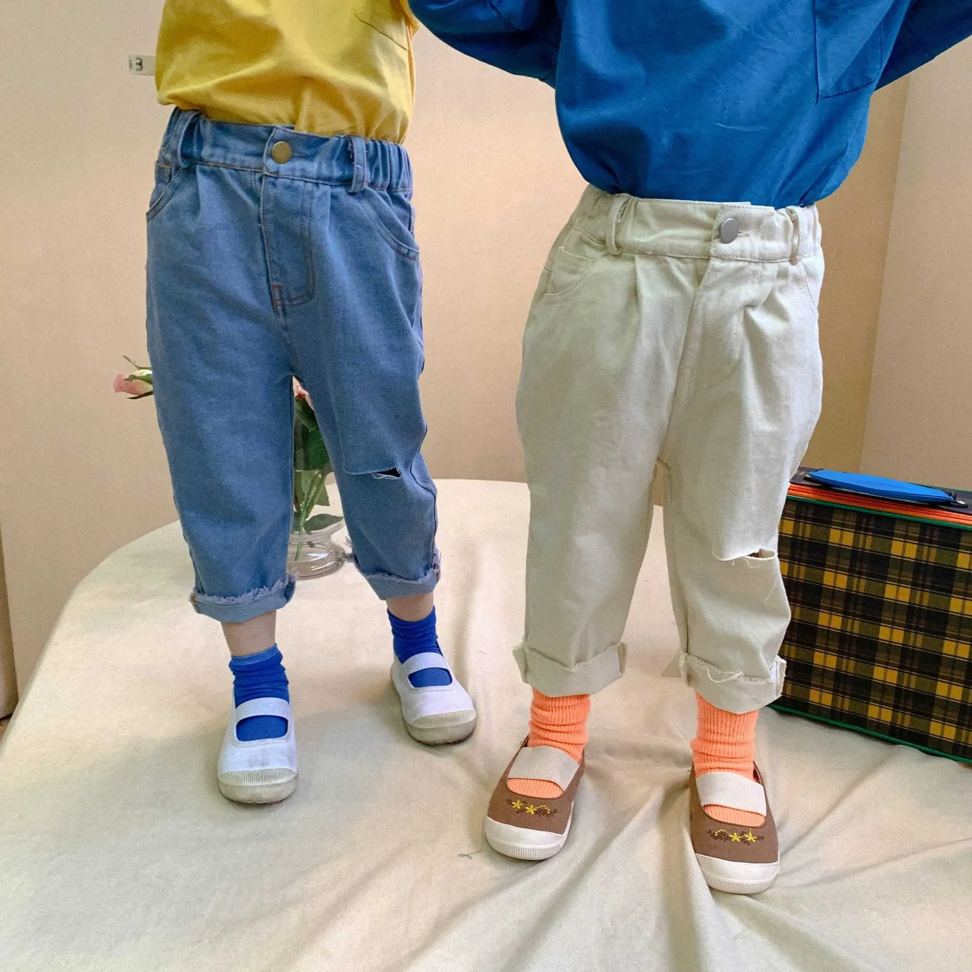 Wiosna Unisex Moda Ripped Jeans Chłopcy i dziewczęta Frędzle Dżinsowe Spodnie 1-6y 210708
