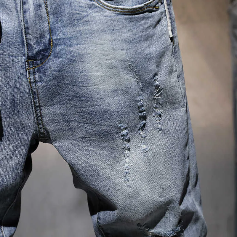 Hommes Ripped Casual Skinny jeans Pantalons Marque De Mode homme streetwear Lettre imprimé en détresse Trou gris Denim pantalon 210723
