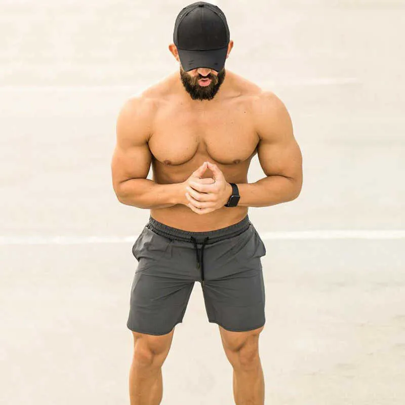 Homens fitness ginásios shorts bodybuilding corredor treino rápido-seco calças macho verão slimfit solto praia calças 210714