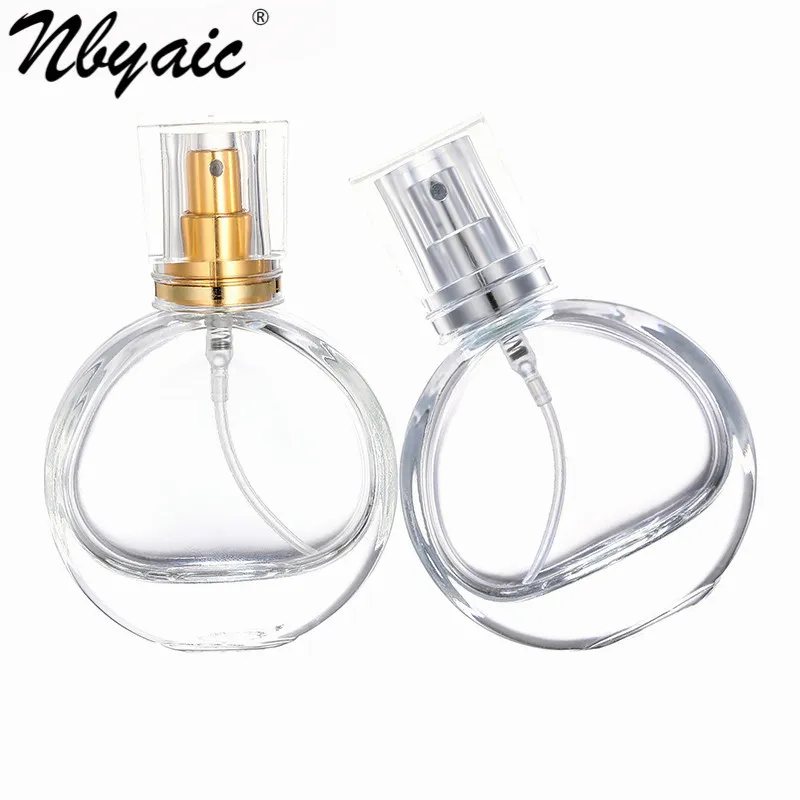 Perfume replacement bottle 25ml travel circular transparent glass empty bottle gold and silver nozzle press spray bottle