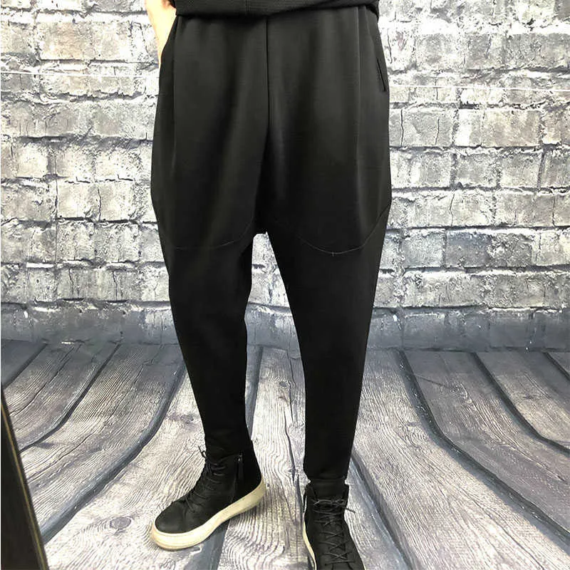 Pantalones holgados simples japoneses con entrepierna grande para otoño e invierno, pantalones harén finos y elásticos oscuros para hombre, informales negros puros 210715