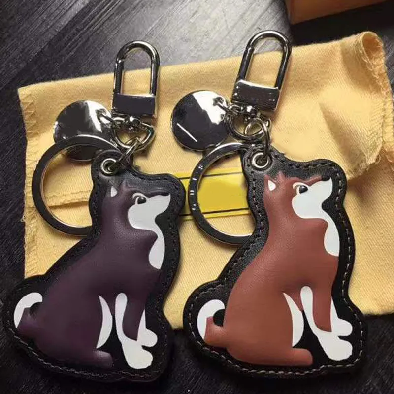 Fashion Chai Dog Keychains Luxury Designer Leather Key Chain Laser präglade väskhängen med Box290U