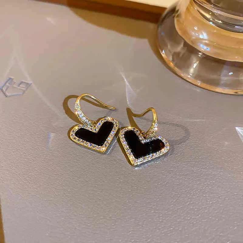 Pendientes de viento frío simples y elegantes de Corea del Sur con microincrustaciones de circón amor lleno de temperamento de diamante negro