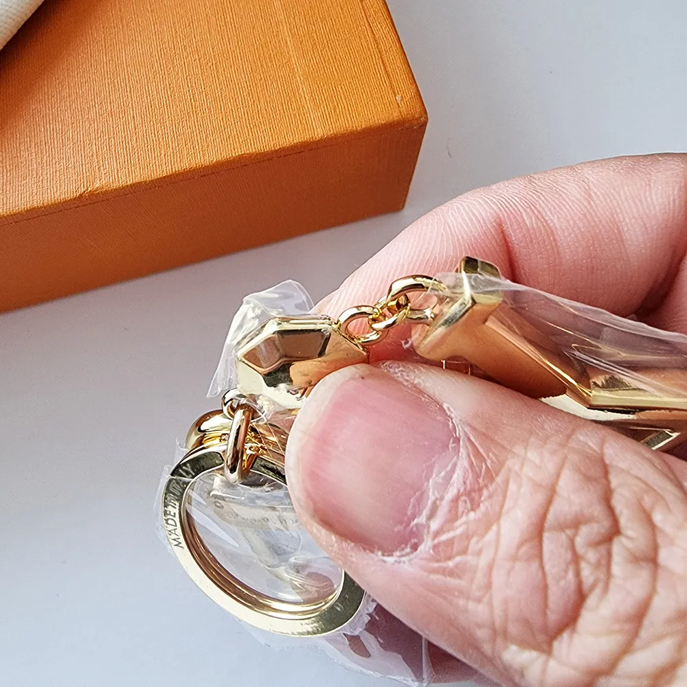Nieuwe legering gouden ontwerp astronaut sleutelhangers accessoires designer sleutelhanger massief metalen autosleutel ring geschenkdoos packing207D