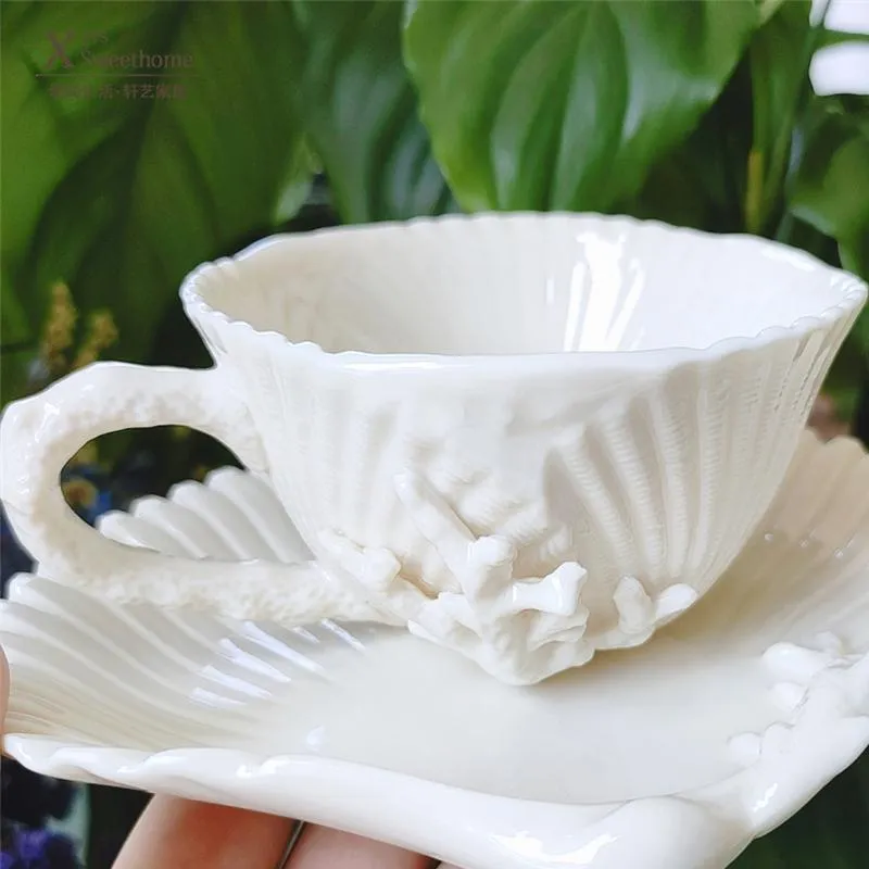 Filiżanki spodki High-end Coral Shell Relief Coffee Cup i spodek Ceramiczny popołudnie Teacup Creative Porcelain Tazas de Cafe292v