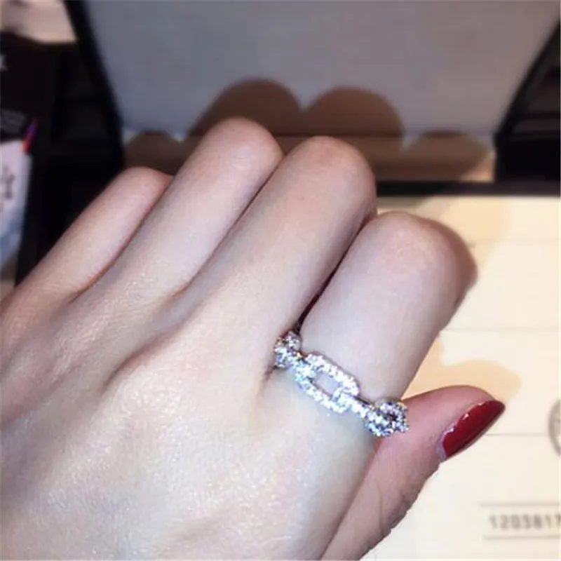 Mode bröllop smycken 100% 925 sterling silver ringar bana vit safir cz diamantkedja kvinnor lyxband finger ring ra0996290g