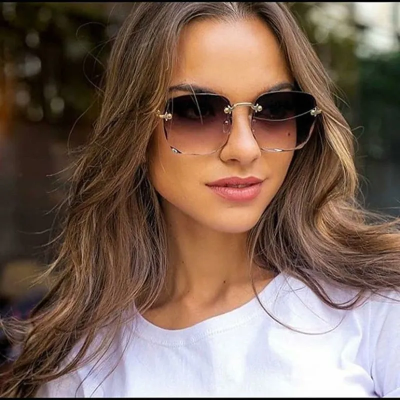 2021 Occhiali da sole senza montatura quadrati Donna Designer di marca di lusso Occhiali rossi estivi Occhiali da sole moda uomo UV400 Shades Oculos