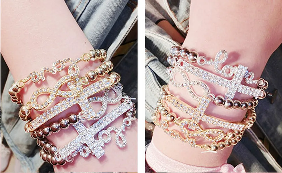 Modeschmuck Charm-Armbänder Ornament Kreuz Diamant Armband elastische Perlen handgefertigte Perlen