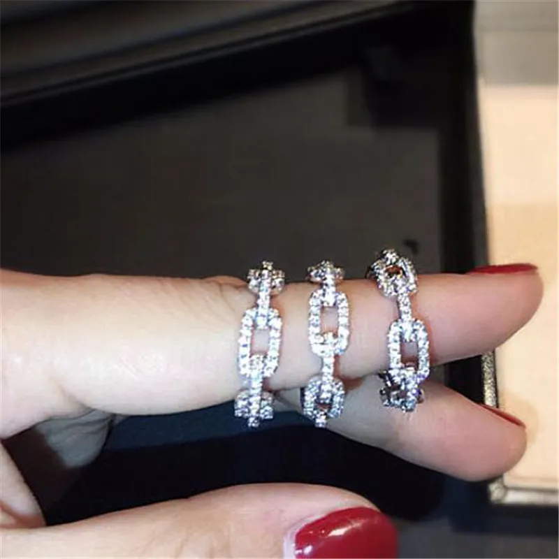 Modebröllopssmycken 100% 925 Sterling Silver Ringar Pave Vit Safir CZ Diamantkedja Dam Lyxband Fingerring RA0996