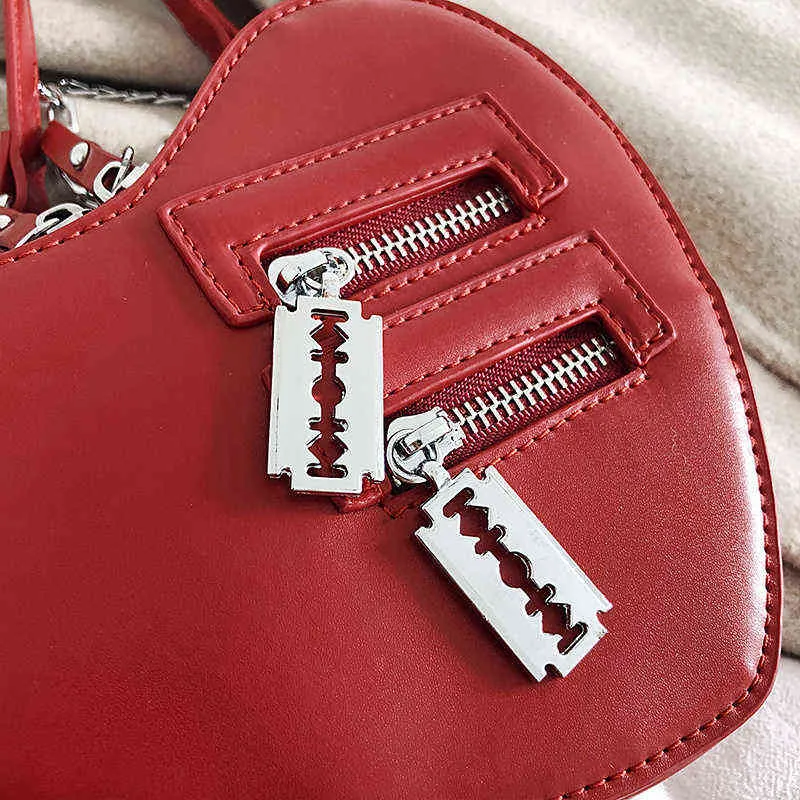 Nxy حقيبة القوطية القلب شفرة سستة سلسلة أكياس crossbody للنساء فتاة عارضة الكتف المحافظ وحافظات تكنولوجيا الصيف المحفظة القوطي 0214