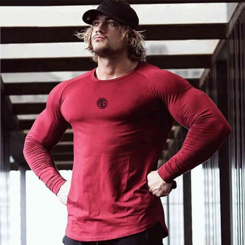 T-shirt a maniche lunghe in cotone primaverile da uomo Palestra Fitness Bodybuilding Allenamento T-shirt skinny Moda maschile T-shirt Abbigliamento sportivo di marca 210421
