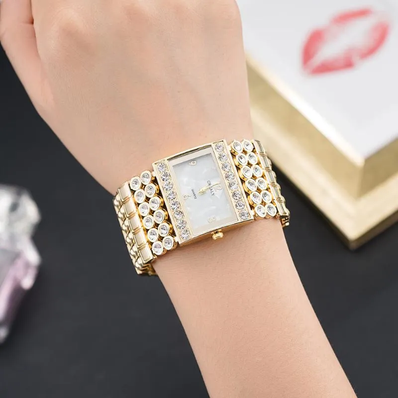 腕時計の気質のレディースヨーロッパとアメリカメッキダイヤモンドシェル合金ブロードバンドファッション装飾ブレスレット203b