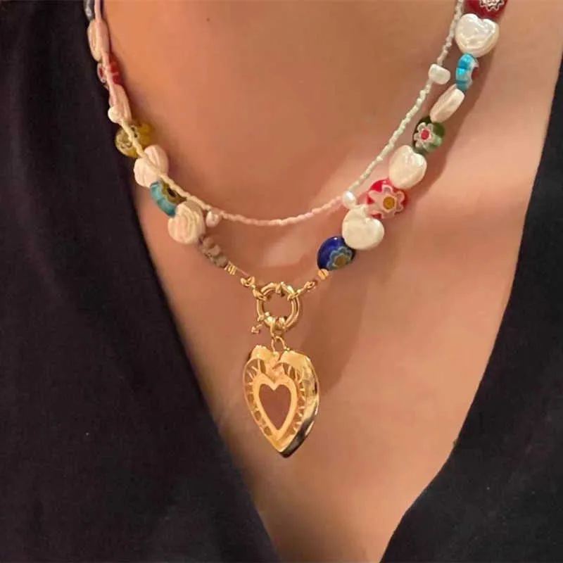 Collana con clip a forma di fiore a coda di pesce speciale di alta qualità con cuore bianco placcato in oro 18 carati