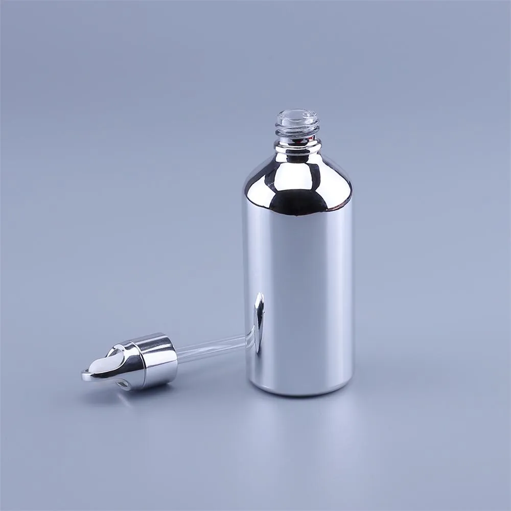 化粧品香水エッセンシャルオイルボトルのためのピペットが付いている100ピース30ミリリットルのUVの銀色のガラスの滴ボトル瓶のバイアル