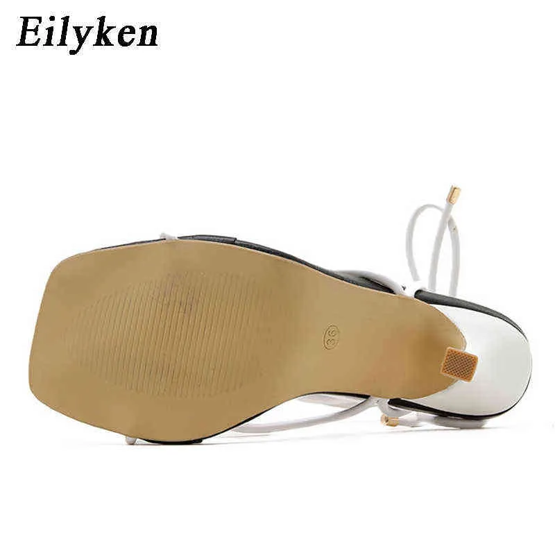 Sandaler EilyKen Ny mode Sexig Lace Up Kvinnor Sandaler Square Toe Thin Heel Cross Bundet Party Skor Hög 9cm Svart Vit Storlek 35-42 220121