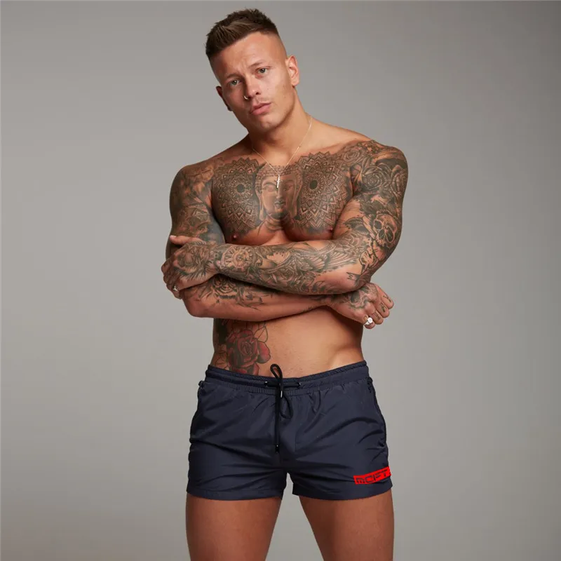 Haute qualité séchage rapide hommes Shorts été plage mode poche fermeture éclair musculation Fitness pantalons courts gymnases survêtement Shorts 210421