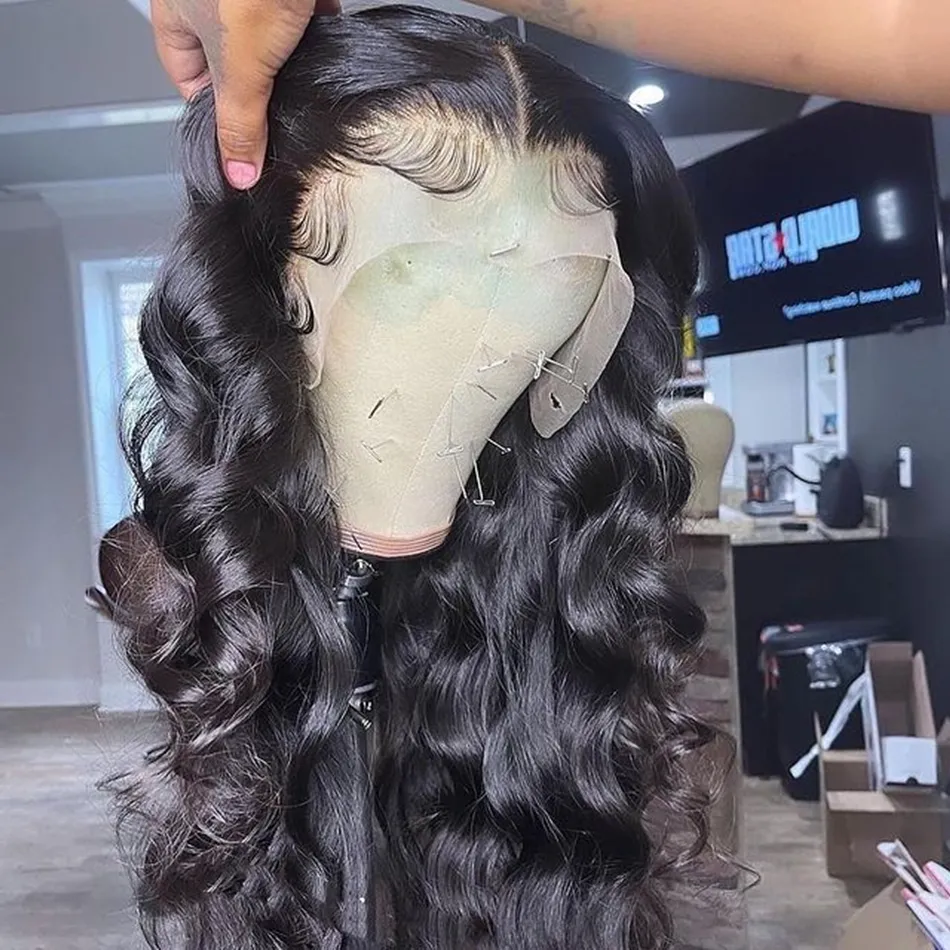 Brazilian Body Wave Babyhår Förplockade spetsfrontperuker för svarta kvinnor Människohår 13X4 Transparent Full HD spets frontalperuk Lös djupvågig peruk