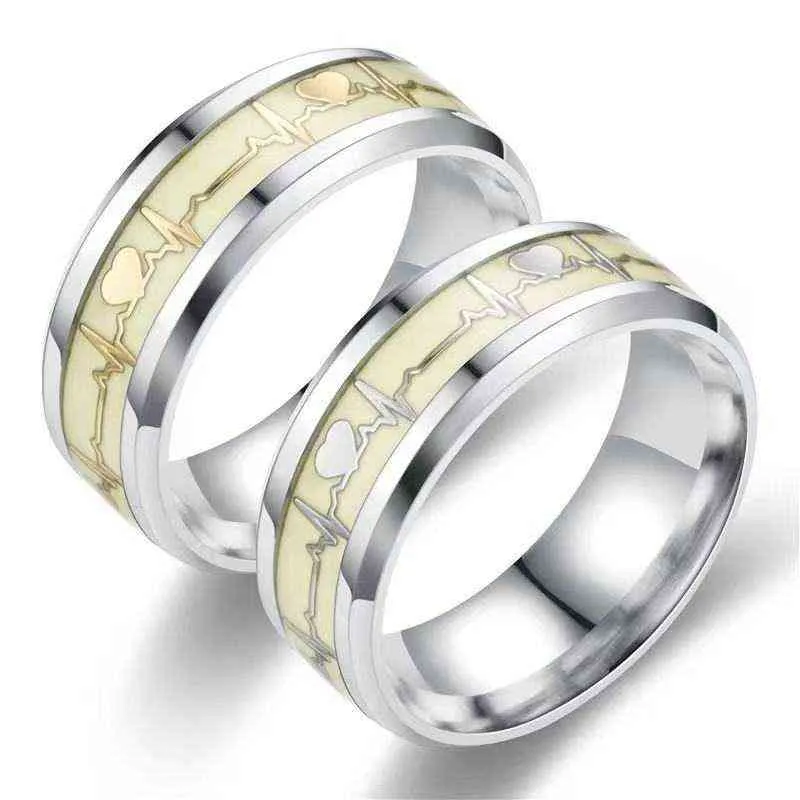 Anillo de dedo luminoso de acero inoxidable de moda para mujeres hombres que brillan en la oscuridad Corazón Pareja Alianzas de boda Accesorios de joyería JZ513 G1125