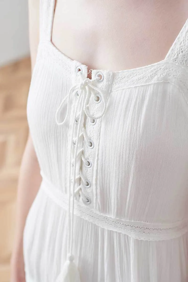 Inspiré coton blanc bretelles d'été à lacets femme tassle décontracté nouveau élégant chic femmes robe 210412