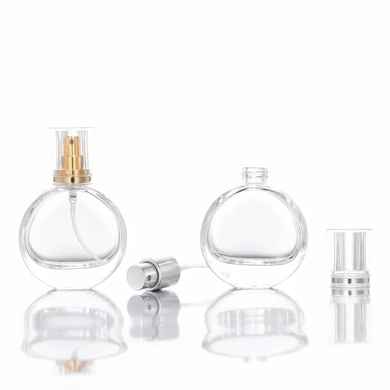 Nbyaic High-end round transparent glass bottle gold and silver perfume sub-bottom 25ml portable press spray empty bottle