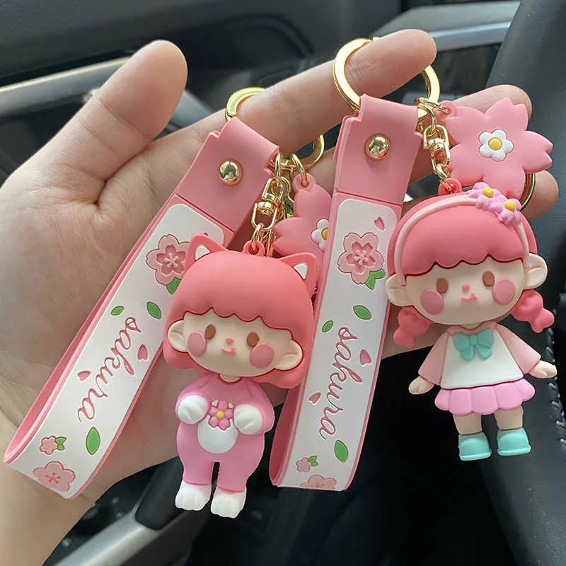 Neuer rosa Kirschblüten-Mädchen-Schlüsselanhänger, süßes Mädchen, exquisiter Rucksack-Anhänger, dreidimensionaler Cartoon-Auto-Schlüsselanhänger, Geschenke, Großhandel G1019