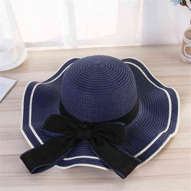 New Summer Women's Boater Beach Hat Wide side Female Casual Panama Hat Lady Classic Flat Bowknot Straw Sun Hat Women wavy Girl G220301