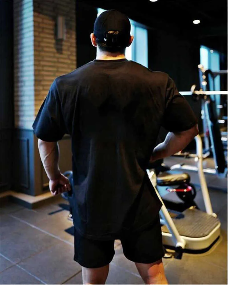 Marca simples ginásio roupas de fitness dos homens oversized t camisa ao ar livre hip hop streetwear solto meia manga camiseta musculação tshirt 23085
