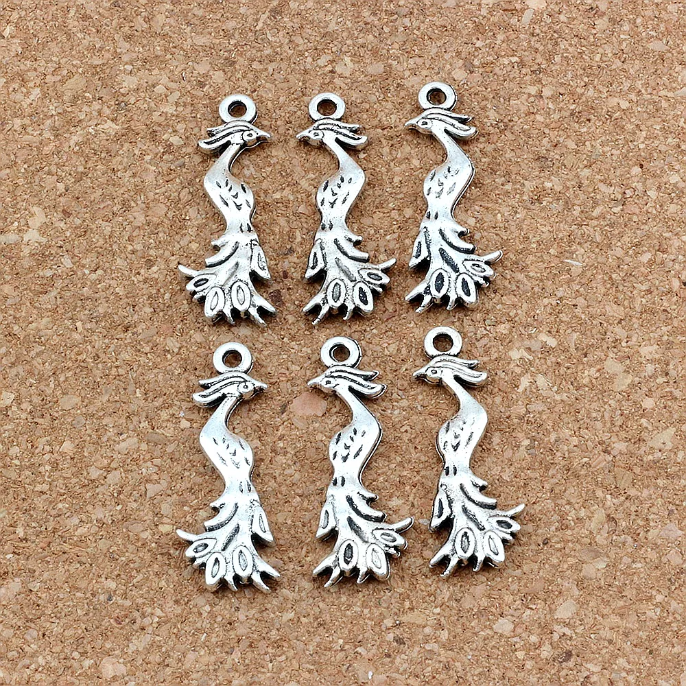 100 Uds. Colgantes antiguos de plata con forma de Fénix para hacer joyas, pendientes, collar y pulsera, 11, 5x32mm, A-252334u