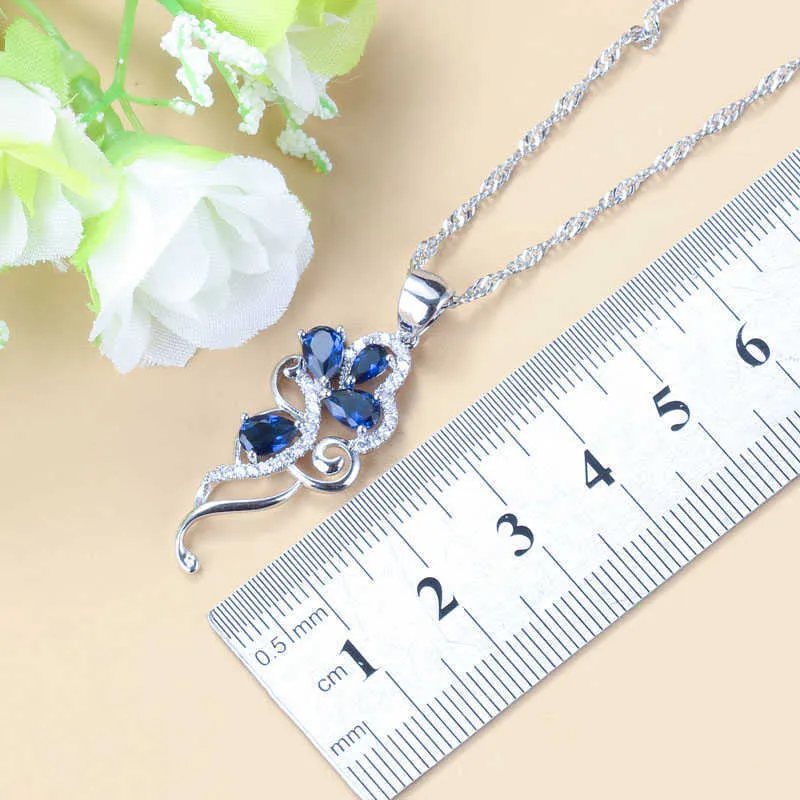 Forma geometrica unica Zircone blu Colore argento Set di gioielli da sposa donna Orecchini pendenti e anello Gioielli in zircone a i H1022