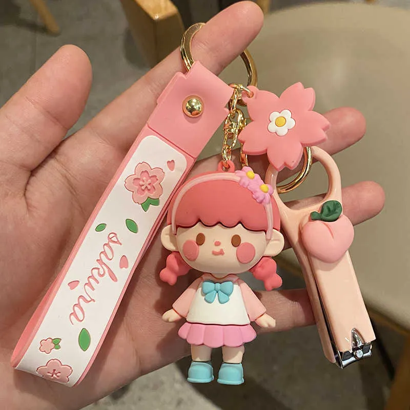 New Pink Cherry Blossom Girl Keychain Cute Girl Exquisite Backpack Pendant Threedimensional Cartoon Car Keyring Gifts Whole G5272655