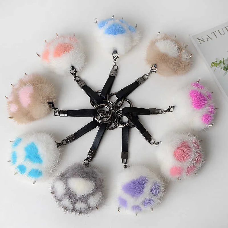 Kvinnor Creative Real Mink Fur Cat Paw Keychain Söt väska Charm Ornament Soft Pompom Plush Sweet Bear Claw Key Ring Car Key Pendant H2782944