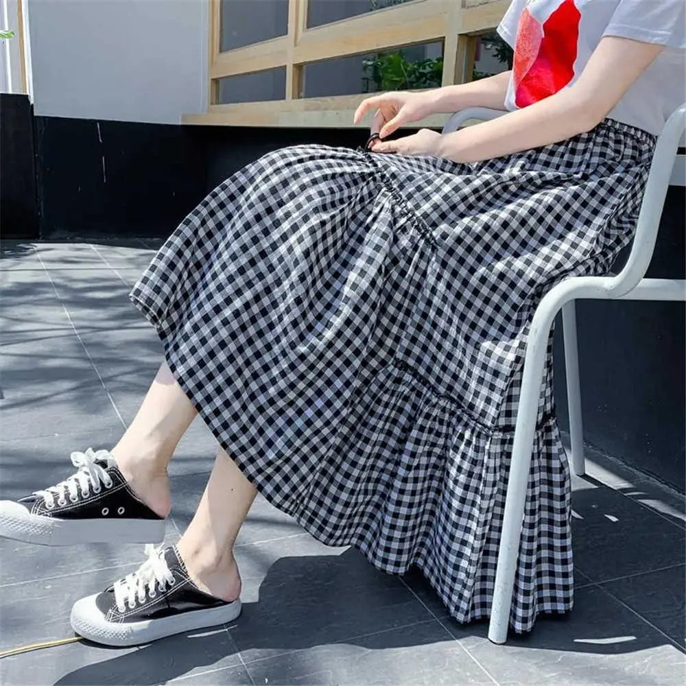 黒い白い格子縞のフリル女性用の不規則なプリーツスカート夏ハイウエストヴィンテージaラインロングスカート